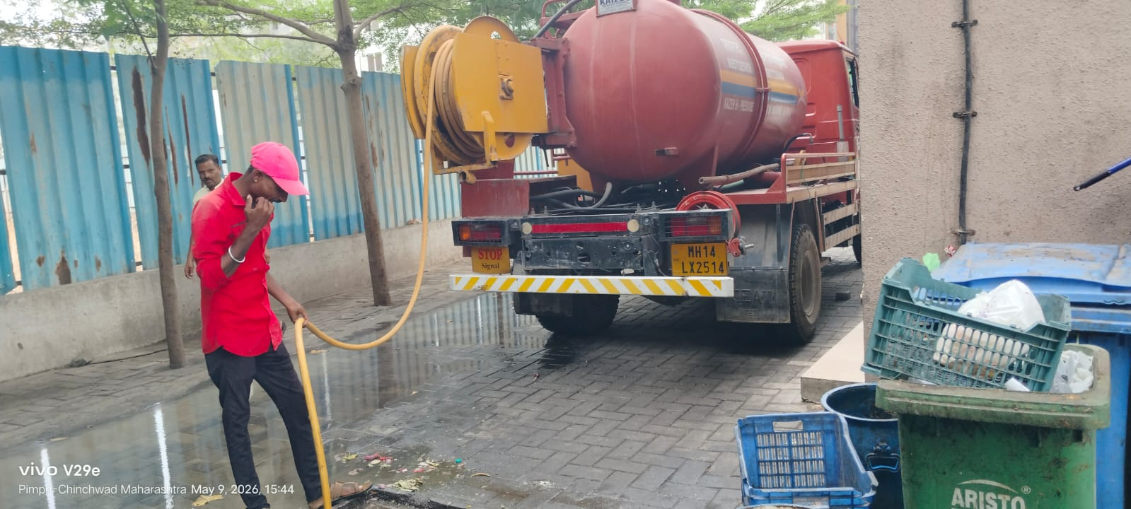 Vacuum tanker at a customer service location
